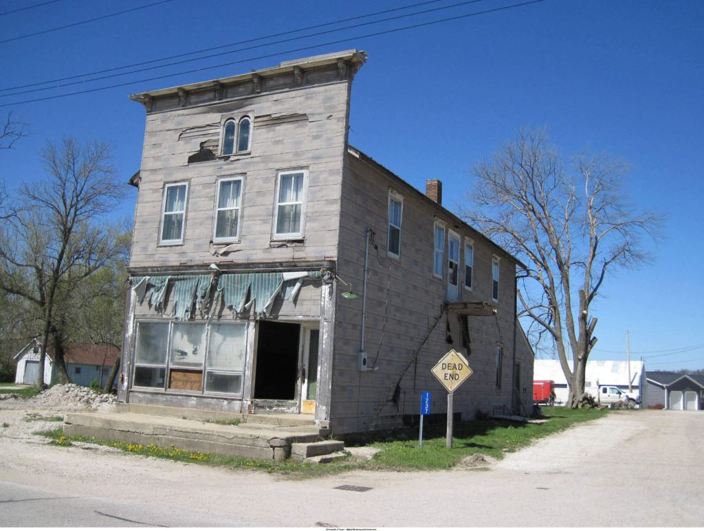A dilapidated storefront in Festina, a town in Winneshiek County. (Photo by William Whittaker, Office of the State Archaeologist, University of Iowa)
