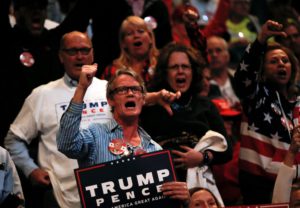 Supporters of Republican U.S. presidential nominee Donald Trump scream and gesture at members of the media in a press area at a campaign rally in Cincinnati, Ohio, U.S., October 13, 2016. (Mike Segar/Reuters)
