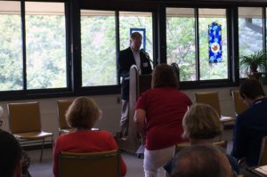 Ed Cranston with First Presbyterian Church Servanthood Ministry in Iowa City welcomed about 50 visitors to the church on Aug. 17, 2016 for a discussion on refugee assistance he jointly organized with Iowa Sen. Joe Bolkcom. (Lynda Waddington/The Gazette)