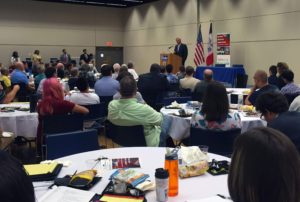 U.S. Secretary of Agriculture Tom Vilsack presented a lunch-hour keynote address to attendees of the LGBT Rural Summit at Drake University in Des Moines on Aug. 18, 2016. (Lynda Waddington/The Gazette)