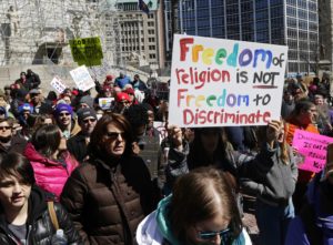Demonstrators gathered at Monument Circle in Indianapolis on March 28 to protest a controversial bill signed by Indiana Gov. Mike Pence. More than 2,000 people gathered at the Indiana State Capital to protest the state's Religious Freedom Restoration Act, saying it would promote discrimination based on sexual orientation.