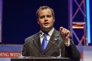 Josh Duggar, acting in his capacity as executive director of the lobbying arm of the Family Research Council, speaks at a Family Leadership Summit in Ames, Iowa in this 2014 file photo. Cable network TLC has pulled all episodes of the long-running "19 Kids & Counting!" reality show featuring the Duggar family after reports surfaced that Josh, the oldest son, had molested young girls. (Brian Frank/Reuters)
