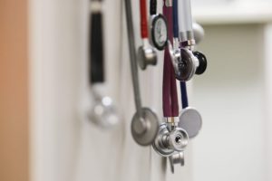 Stethoscopes hang in a clinic hallway on May 10, 2017. (Rebecca F. Miller/The Gazette)