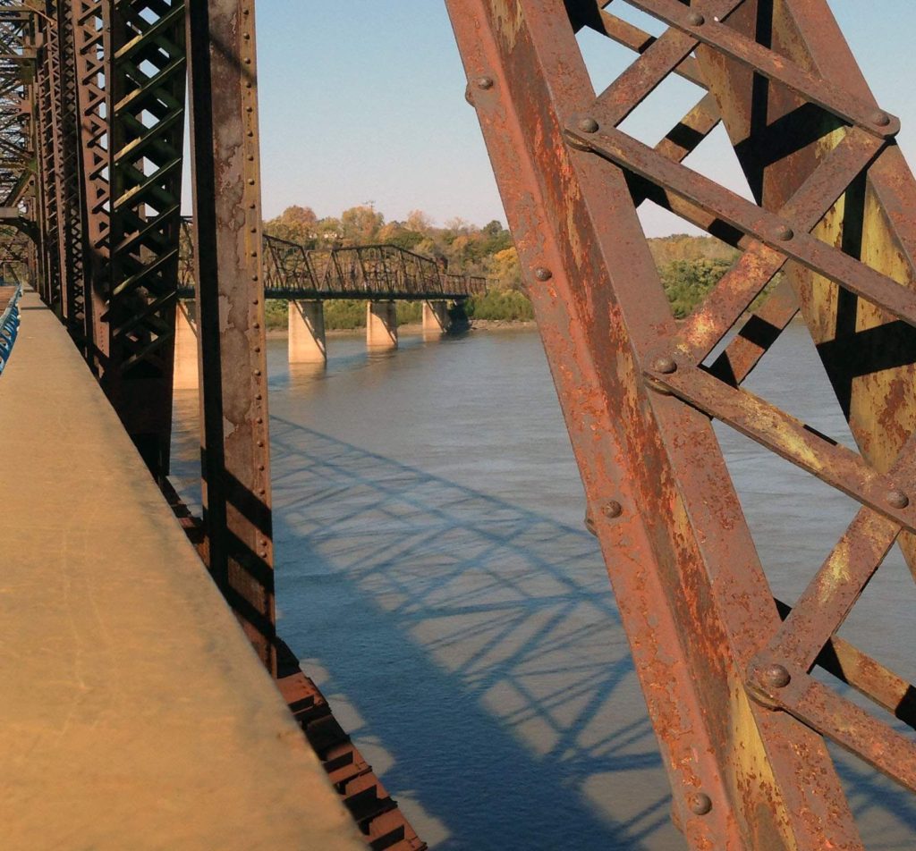 The old Chain of Rocks Bridge spans the Mississippi River, connecting Illinois with Missouri. Once a part of Route 66, the bridge with its iconic 30-degree bend is now home to pedestrian traffic.