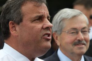 New Jersey Gov. Chris Christie (left) talks to reporters in July as he stands with Iowa Gov. Terry Branstad at MJ's Restaurant in Marion.