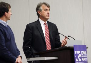 Iowa Democratic Party Chair Scott Brennan (right) answers questions at a January 2014 Cedar Rapids forum.