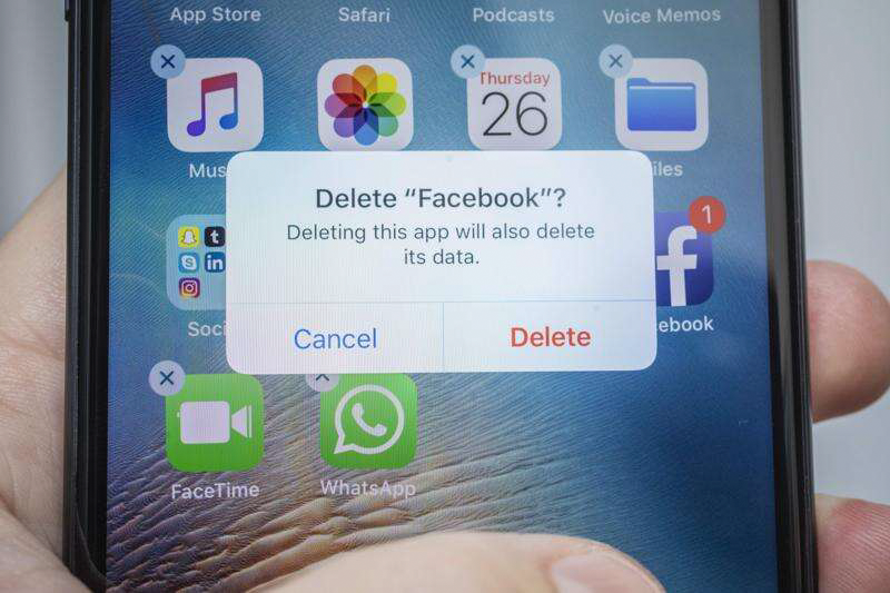A mobile device displaying a Facebook app deletion verification screen.